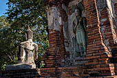 Ayutthaya, Thailand. Wat Mahathat, a small vihara with a chedi and a Buddha image near the eastern side of the eclosure.